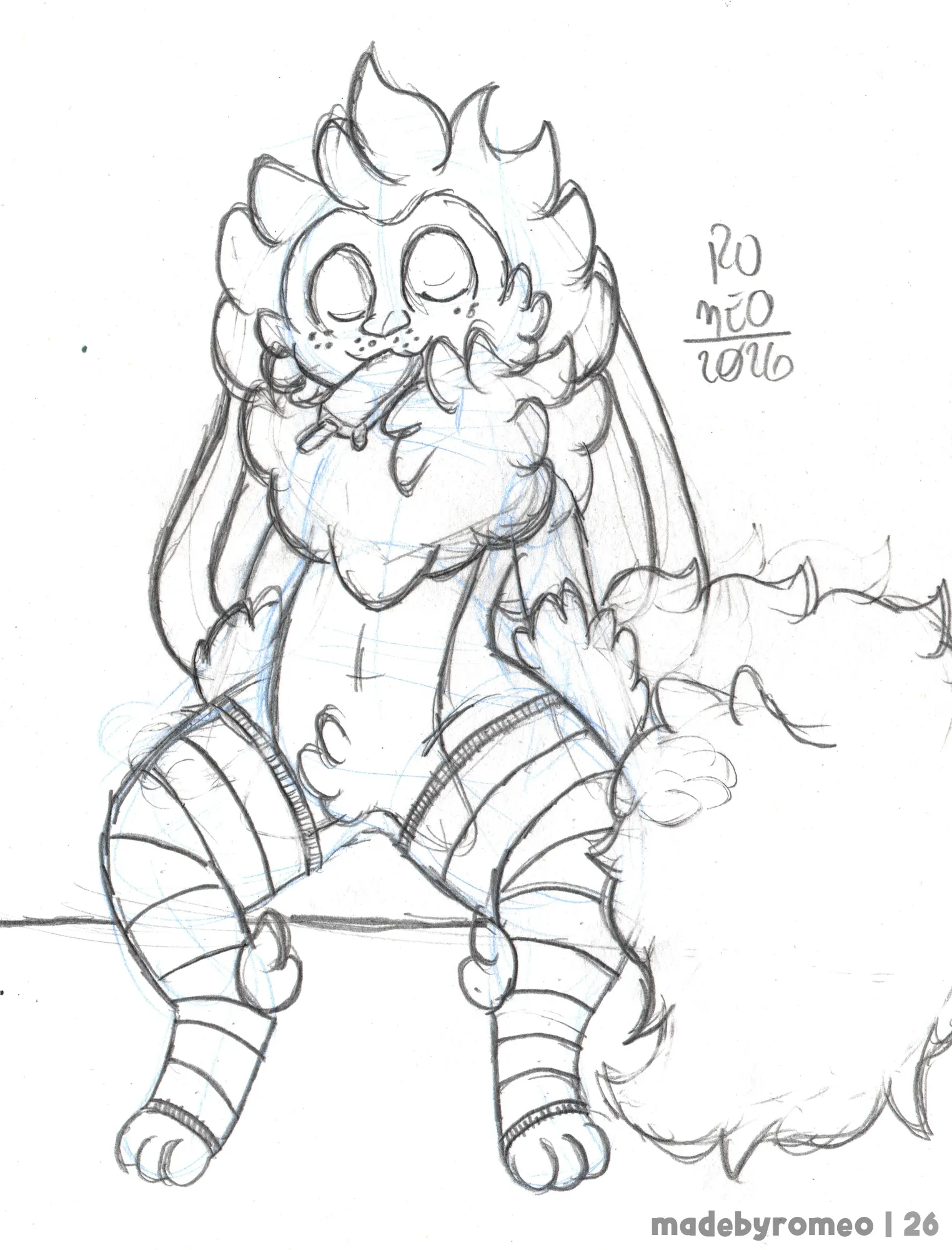 O Romeo sentado, com as patas apoiada no chão e chupando um picolé