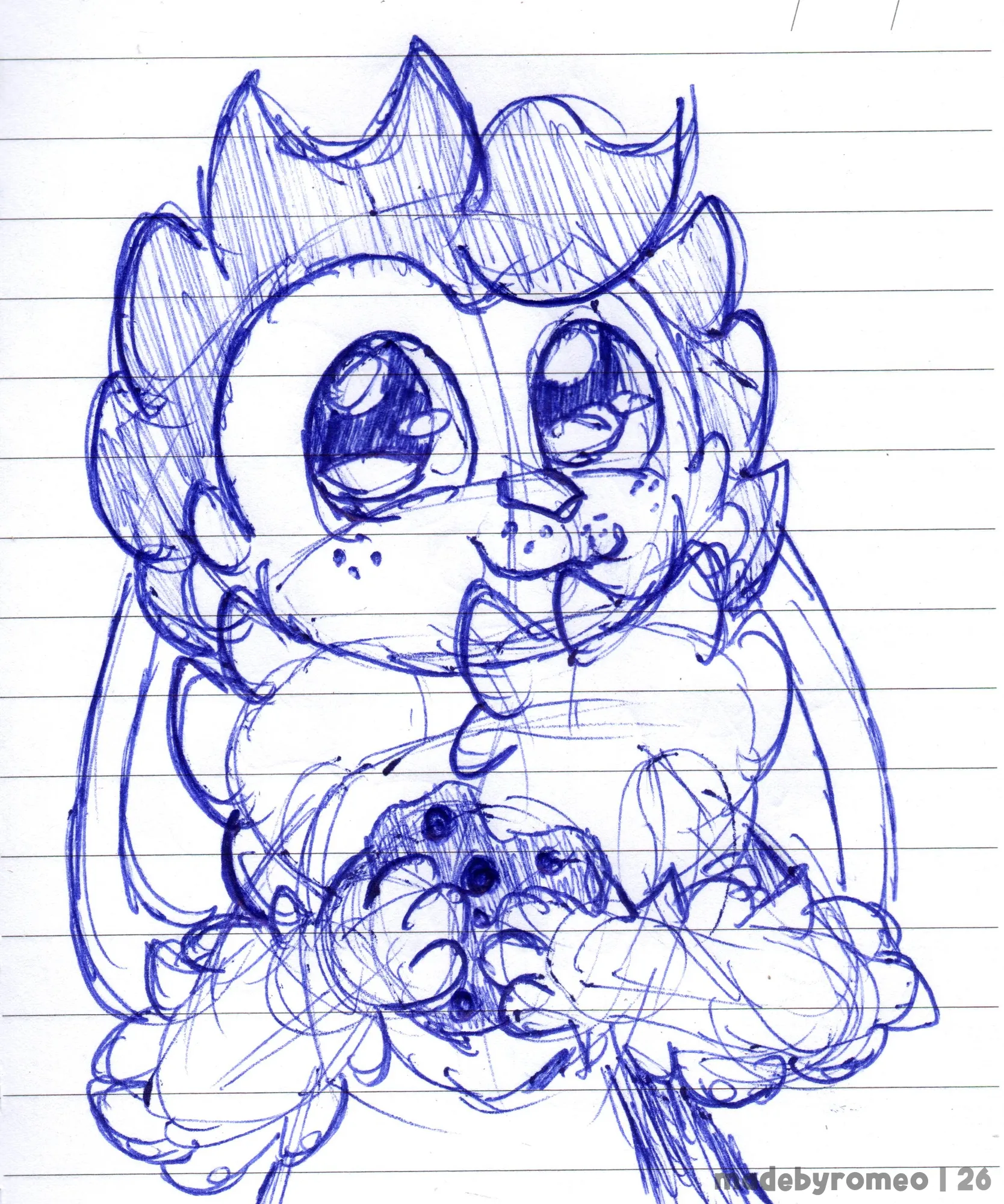 O Romeo está segurando um Cookie, que já está mordido em um pedaço.